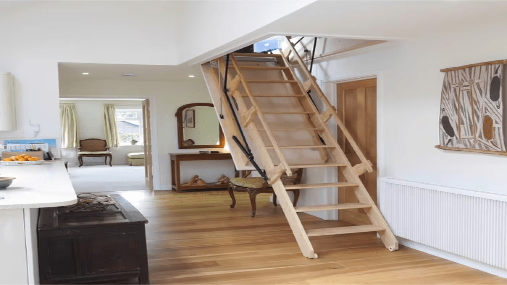 Pull-down attic stairs leading to floored attic space